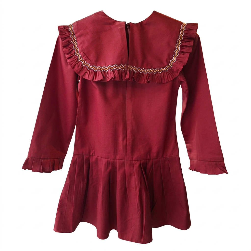 Robe fille à plastron smocké, couleur rouille.