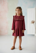 Robe fille à plastron smocké, couleur rouille.