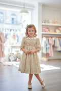 Robe à smocks en coton plumetis, fleurie.