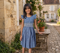 Robe à smocks bleu fleuri avec petites manches