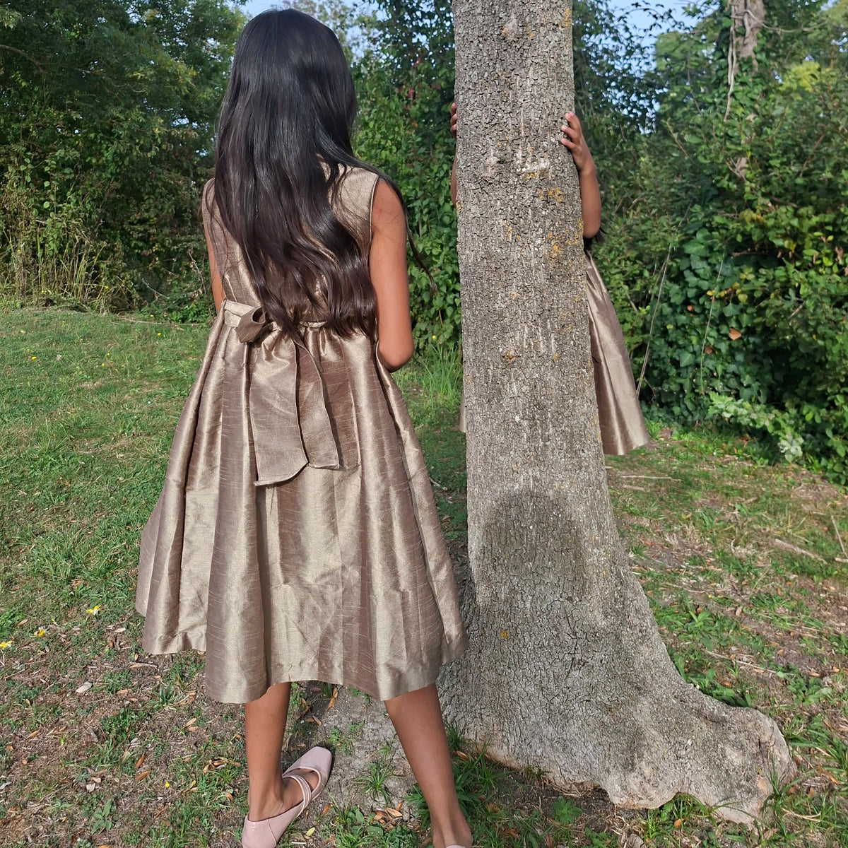 Robe smockée en soie sauvage. 10 ans