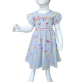 Robe à smocks fleurie bleu gris, doublée.